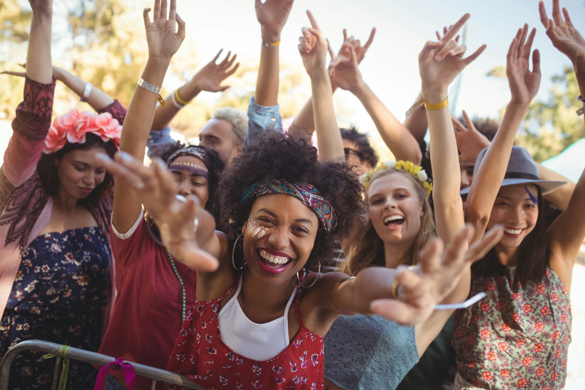 cheerful-woman-enjoying-at-music-festival.jpg